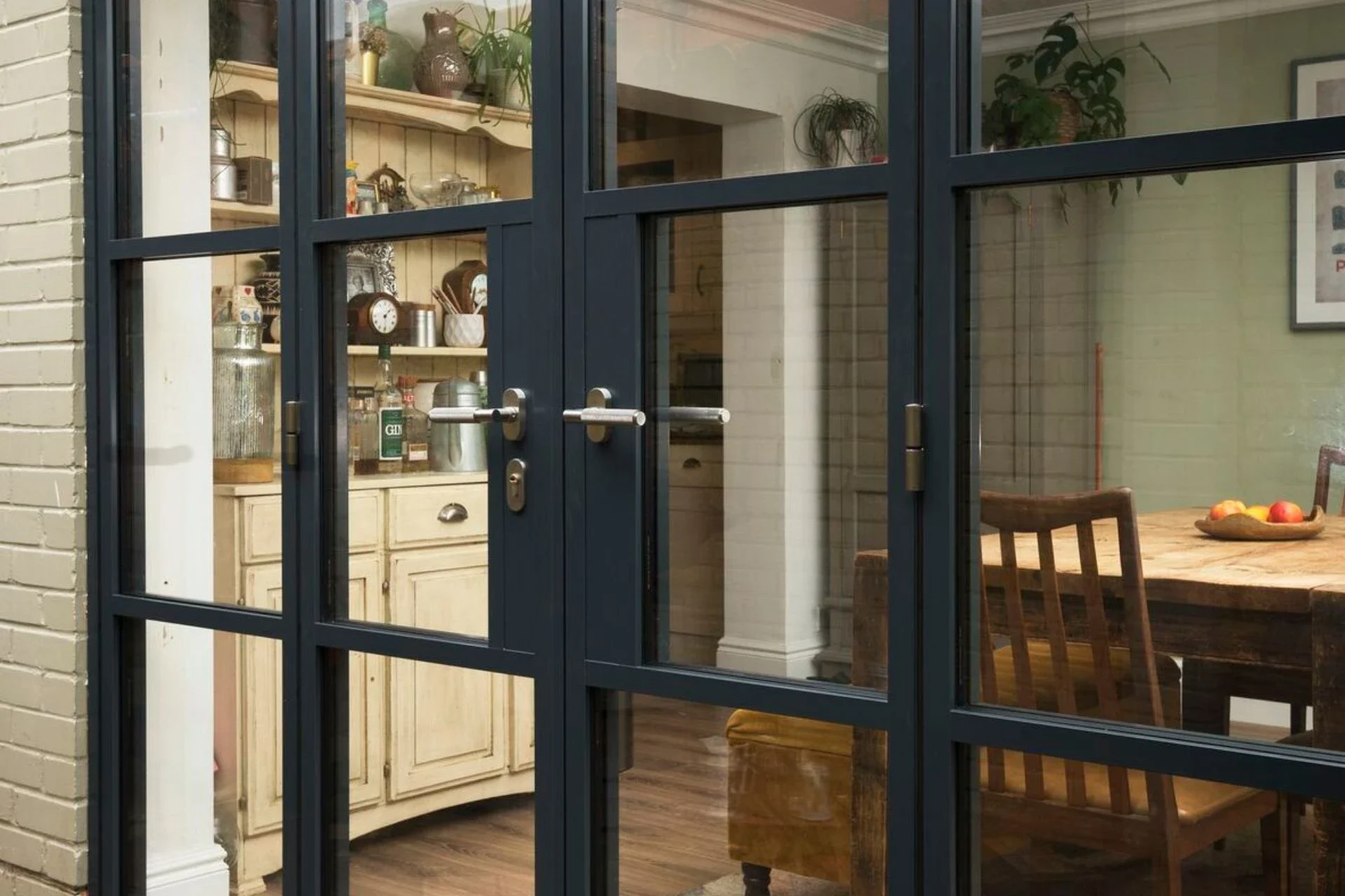 Close-up of black heritage French doors and glazing bars