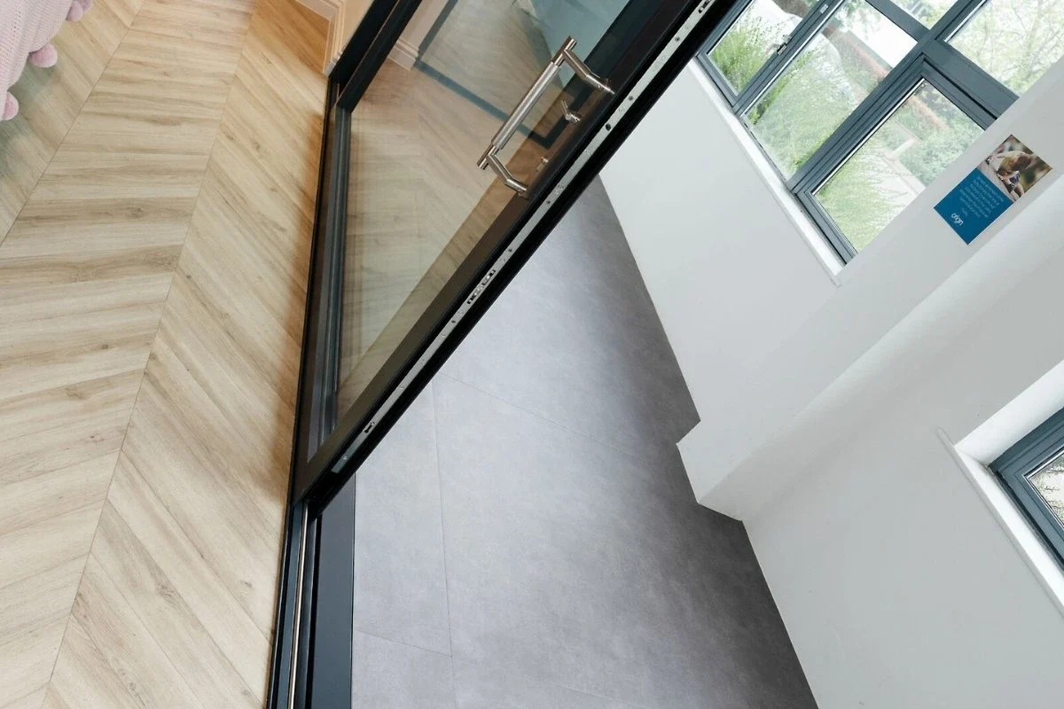 Close-up of a slimline sliding door frame and track