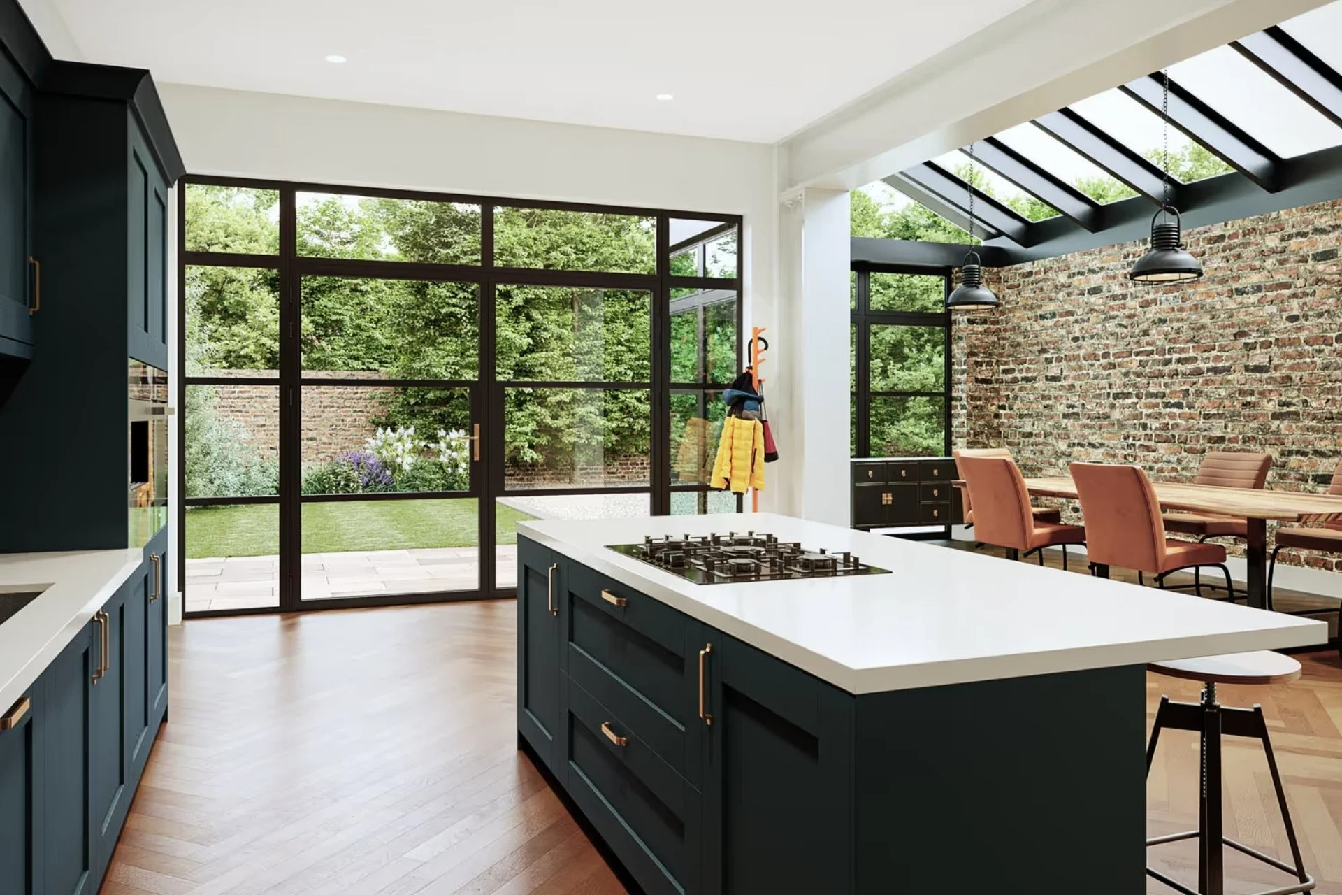 Black aluminium double doors bringing garden views into a kitchen