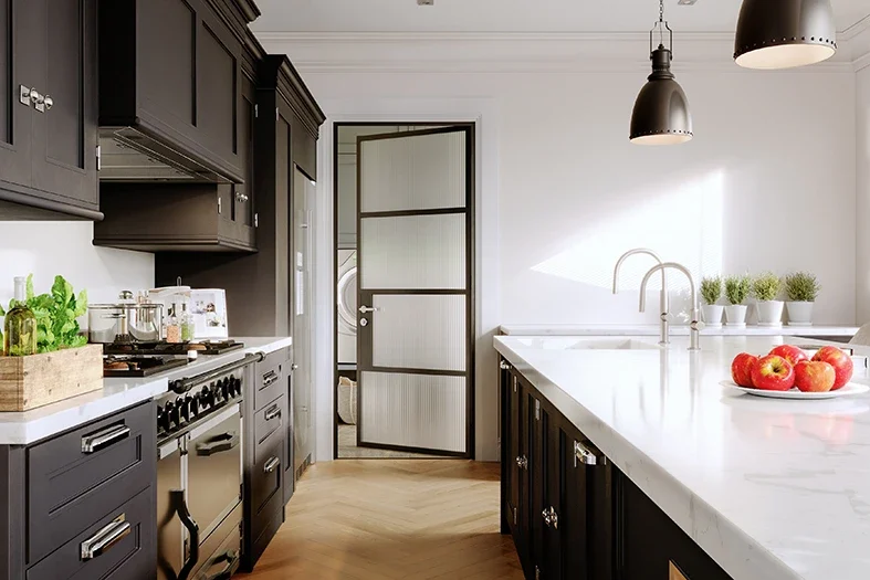 Black aluminium glazed utility door adjoining a kitchen