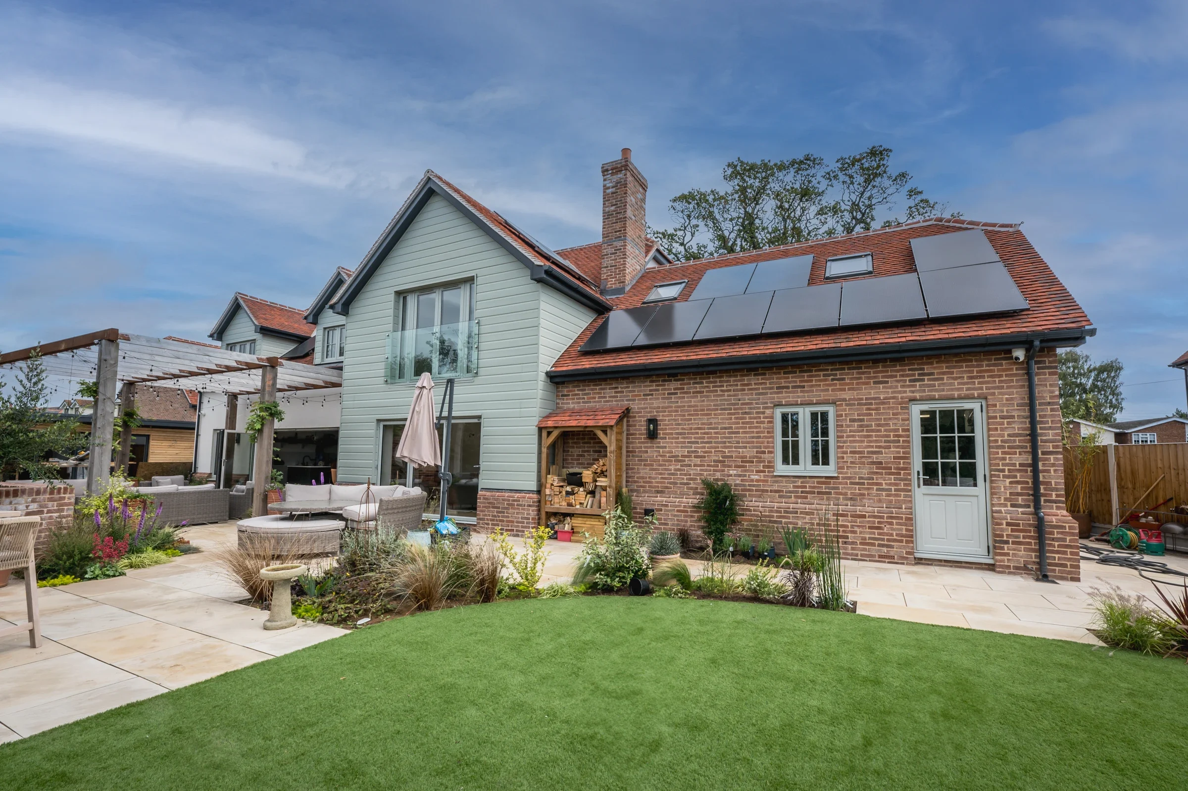 Flush uPVC windows on a renovated house with landscaped garden