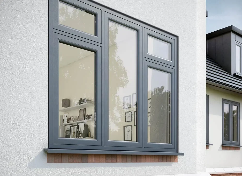 Flush aluminium windows installed in a rendered house