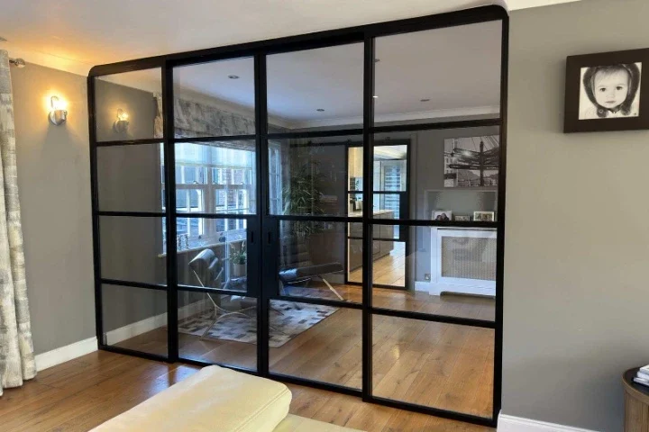 Internal sliding glass doors with slim black frames