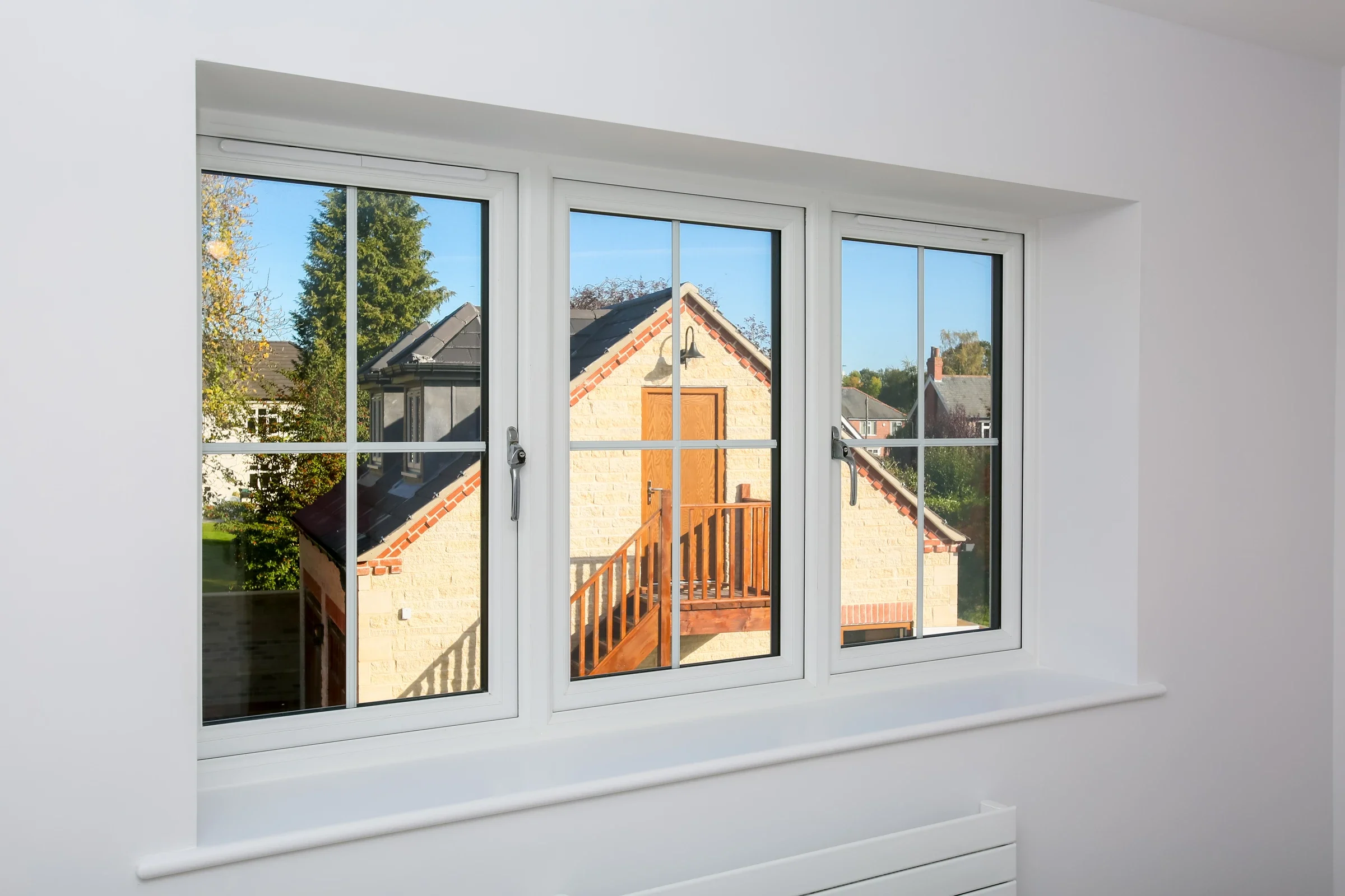 White interior face of uPVC casement windows in a bright room