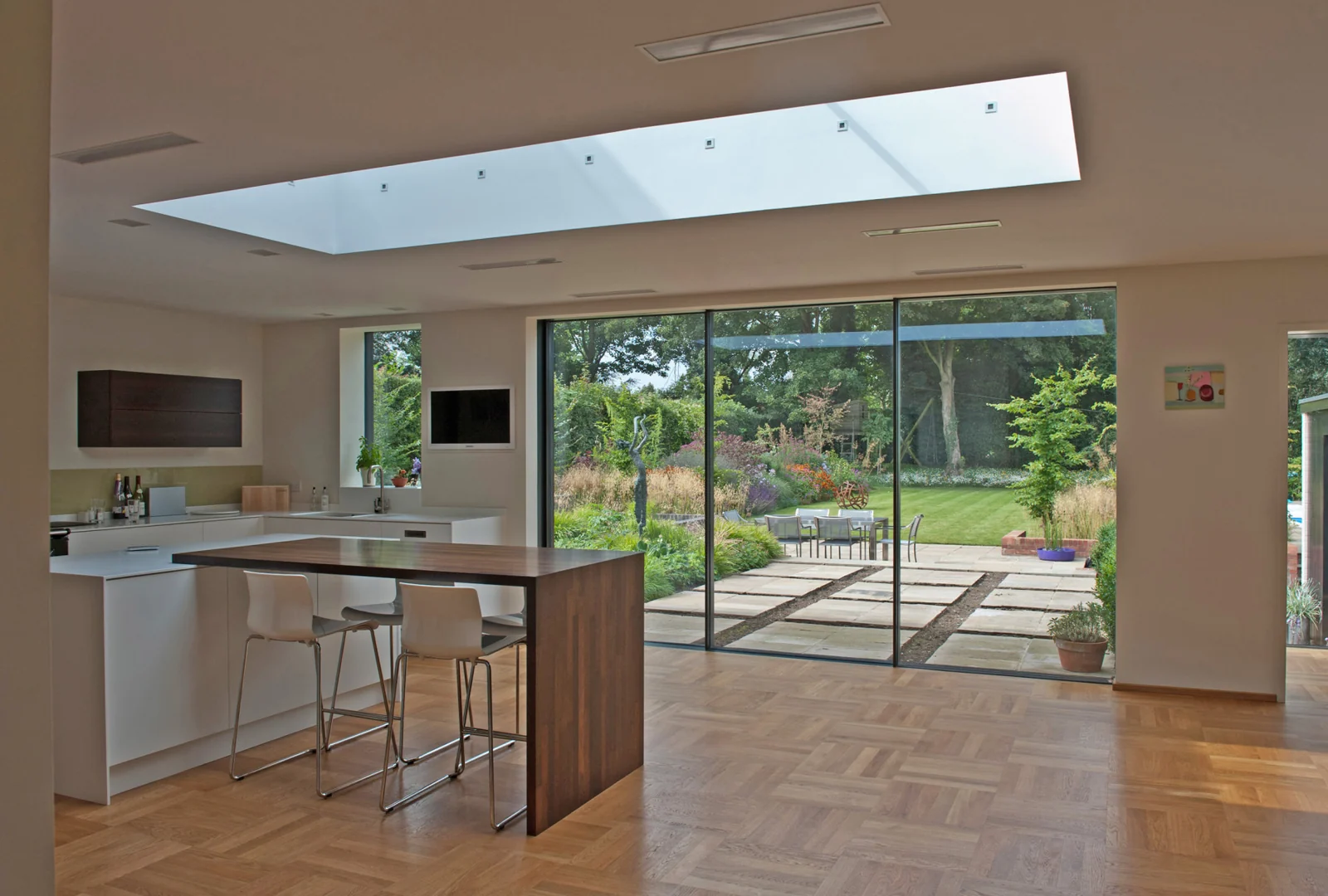 Flat roof glazing above a kitchen extension in Chesham Bois