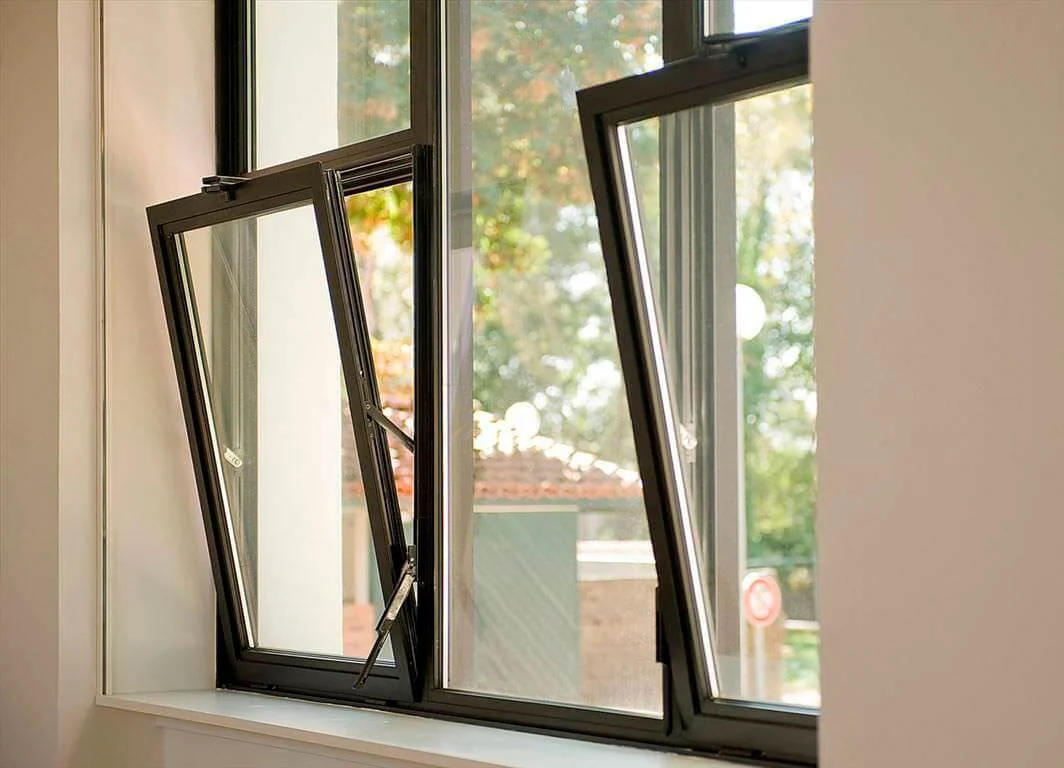 Aluminium windows demonstrating tilted and inward-open positions